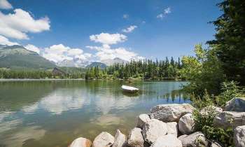 Puzzle 4800 - Barque sur lac en montagne