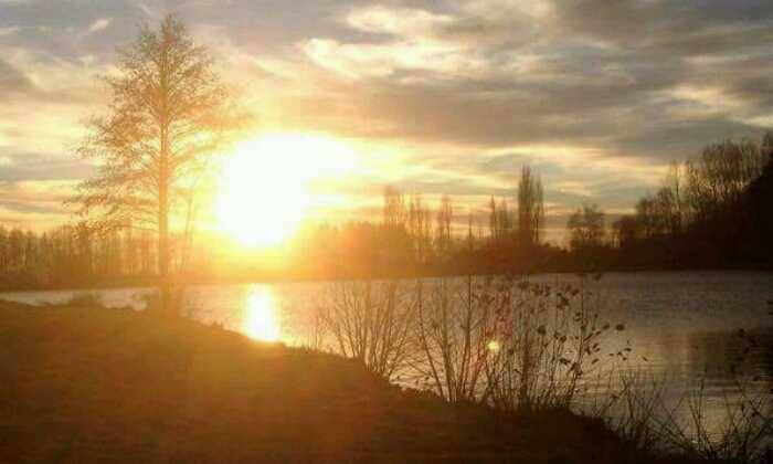 Puzzle Coucher de soleil sur Lac