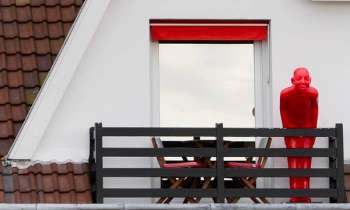 Puzzle 10294 - une sculpture au balcon