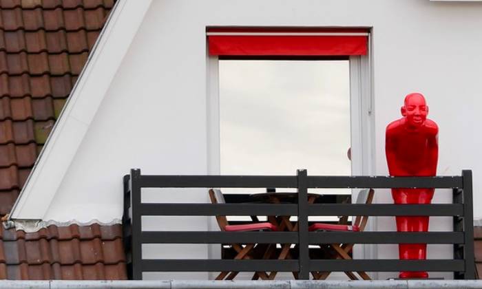 Puzzle une sculpture au balcon