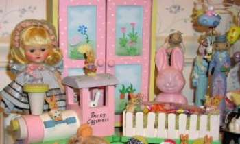 1345 | Lapin de Pâques - Notre lapin malin est tout heureux de voir sa jolie amie la poupée émerveillée devant son cadeau : une machine à délivrer des oeufs de Pâques à volonté !